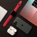 Apple To "Quietly" Announce New iPads, Macs And Others This Week Flat Lay of different apple products on a grey background.