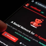 Meta acquires AI Agent Social Network Moltbook to Expand AI Ambitions moltbooks-beta-social-network-for-ai-agents-displayed-on-smartphone-screen-a-person-s-thumb-hovers-over-the-i-m-a-human-butt